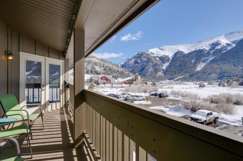a balcony with chairs and a view of the mountains at Walk to Copper Mountain Lifts Mtn-View Condo in Copper Mountain
