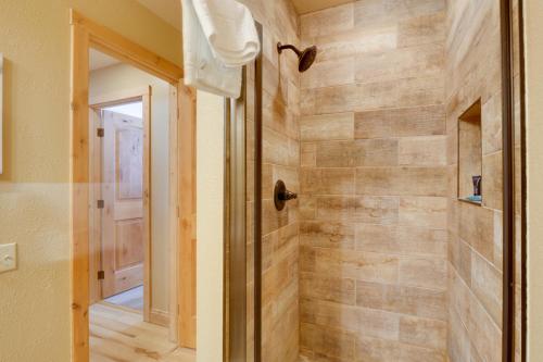 a bathroom with a walk in shower in a room at Walk to Copper Mountain Lifts Mtn-View Condo in Copper Mountain