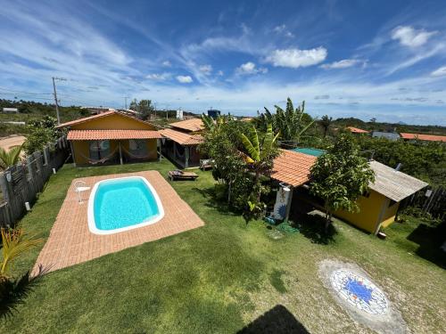 an aerial view of a backyard with a swimming pool at Casa Pathuá Corumbau in Corumbau