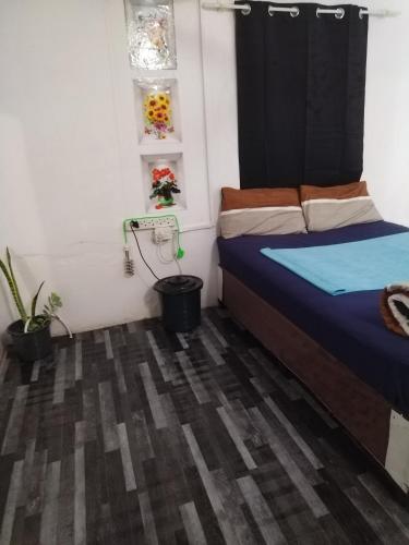 Llit o llits en una habitació de Mighty's Home