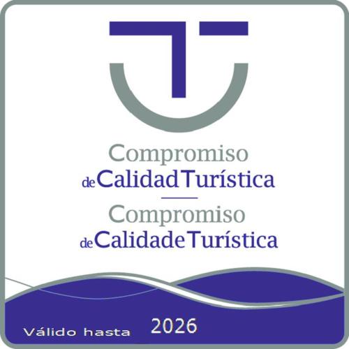 a logo for the committee of colaldicated tutsica at Casa Puertas Bed & Breakfast sl in Oia