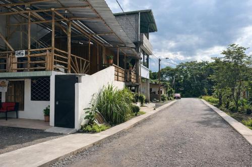 an empty road in front of a building at Puyo River Room in Puyo
