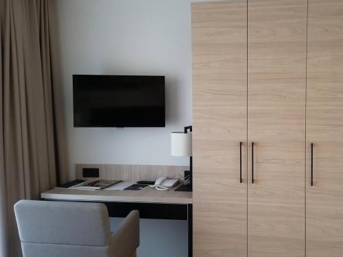 Televisyen dan/atau pusat hiburan di Bristol Aparthotel