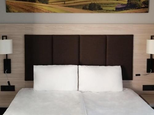 Katil atau katil-katil dalam bilik di Bristol Aparthotel