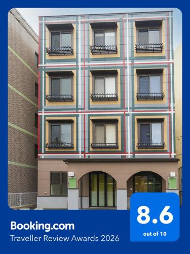 an image of a building with the words travel review awards at HOTEL 萃 the 3rd-雑餉隈駅前-無人ホテル-HOTEL SUI the third-ZASSHO-Unmanned Hotel in Fukuoka