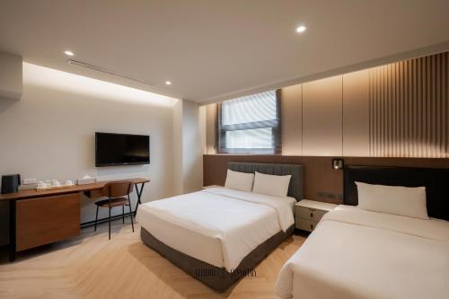 Llit o llits en una habitació de York Hotel
