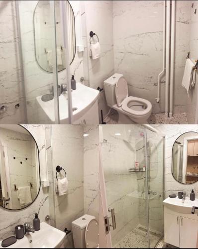 a bathroom with a sink toilet and a mirror at Apartman48Brzeće in Brzeće