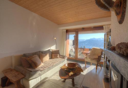 Appartement Gemeaux 204 sur la place du Village a Anzere avec vue sur les Alpes