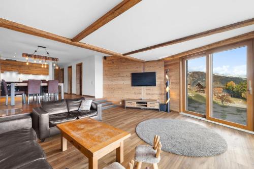Sagittaire T06 sur la place du village a Anzere avec vue sur les Alpes