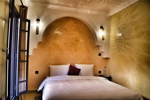 Cama o camas de una habitación en Riad Abjaou