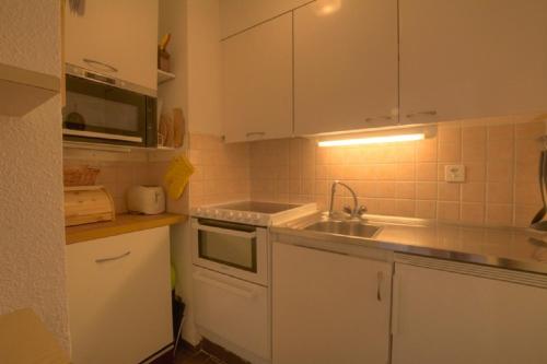 Studio Saturne 108 sur la place du Village a Anzere