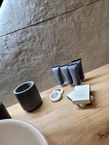 a table with a group of cups on it at Apartament Lubawka in Lubawa