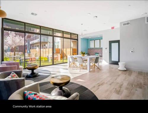 a large living room with a table and chairs at Modern King Bed Unit with Arcade at The Vic Walk to Midtown Downtown in Houston