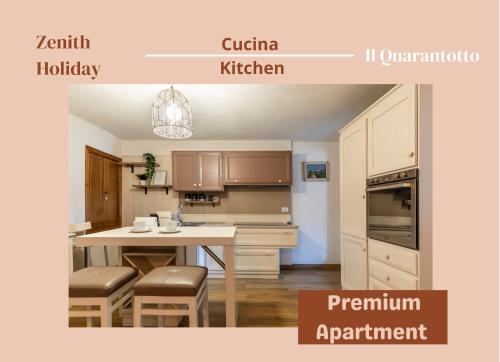 a kitchen with a table with stools in it at Centro storico - 2 min da Piazza Grande - Free Parking in Arezzo