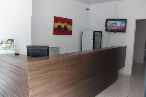 Televisyen dan/atau pusat hiburan di Pousada Vila Pitanga