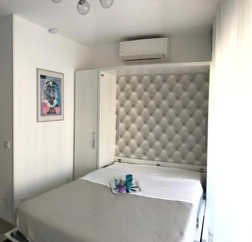 Postel nebo postele na pokoji v ubytování Le Paradis Blue