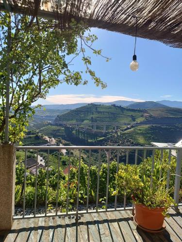 a view from the balcony of a house at Casa do Romezal in Peso da Régua
