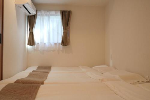 ISSHUKU NOMA池袋III -101 Triple Room
