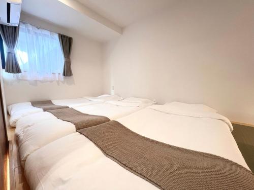 ISSHUKU NOMA池袋III -101 Triple Room