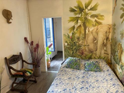 เตียงในห้องที่ Chez iris