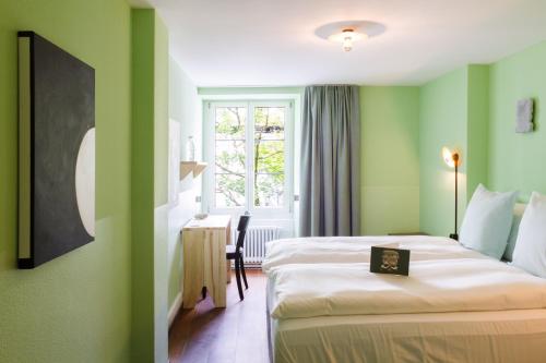 Postel nebo postele na pokoji v ubytování Hotel Schlüssel