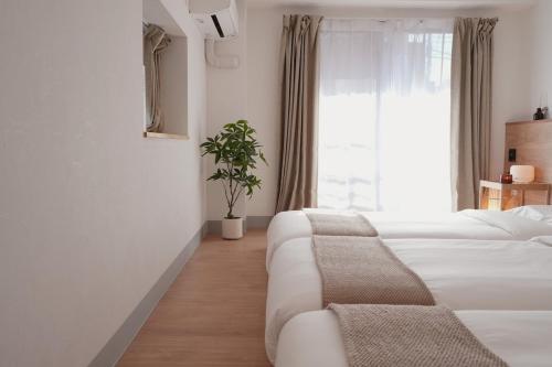 ISSHUKU NOMA池袋III -201 Triple Room