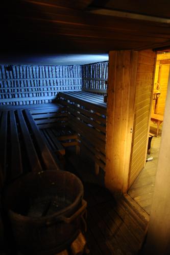 an inside view of a sauna with a barrel at Perlyna Krasiyi in Vyshka