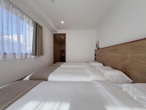 ISSHUKU NOMA池袋III -202 Triple Room