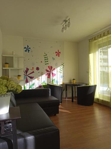 Spacious apartment with garden and private parking