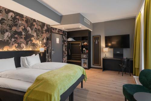 Llit o llits en una habitació de Thon Hotel Opera
