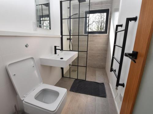 a bathroom with a toilet and a sink at 2 Bed in Brecon oc-59733 in Talgarth