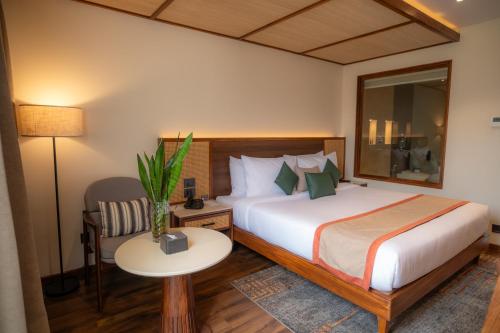 En eller flere senge i et værelse på Siddhartha Riverside Resort, Chumlingtar
