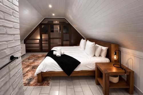 a bedroom with a bed in a attic at 6 On Santorini in Langebaan