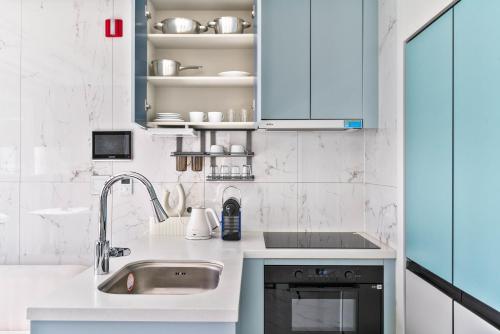 a kitchen with a sink and a counter top at Balance Seoul Stay in Seoul