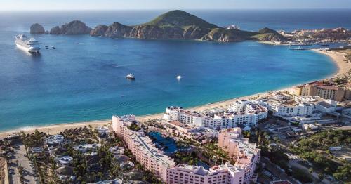 an aerial view of a beach with a cruise ship at Owners Studio Suite, REQUEST DATES- see by Clay & Lisa in Cabo San Lucas
