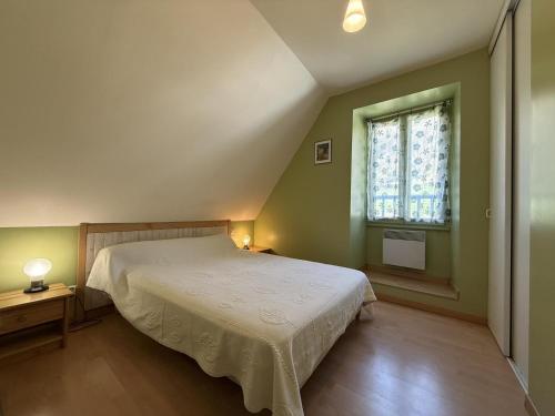Llit o llits en una habitació de Chez requenna