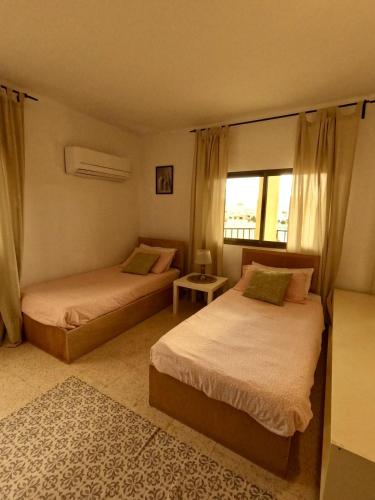 Katil atau katil-katil dalam bilik di B&B petrafarmhouse