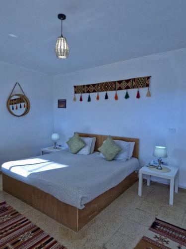 Llit o llits en una habitació de B&B petrafarmhouse