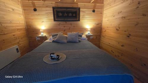 a bedroom with a bed with a cat on it at Romantic Getaway Peace and a Unique View in Quillota