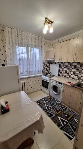 Køkken eller tekøkken på Apartamentul Teilor