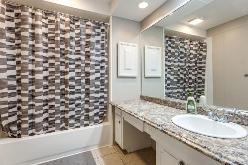 a bathroom with a sink and a shower at Warren County Launchpad: Pet-Friendly Lebanon Apt in South Lebanon