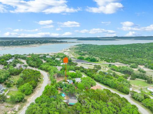 an overhead view of a city with a road and a lake at Coop at Canyon Lake in Canyon Lake