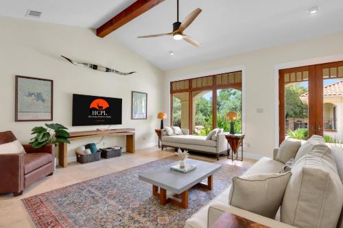 a living room with a couch and a table at Narwhal Ranch in Wimberley