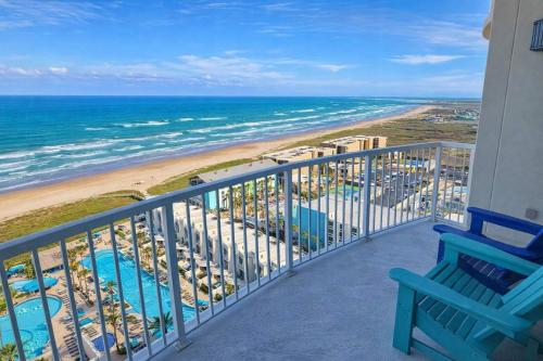 a balcony with a view of the beach and ocean at Sapphire 1706 home in South Padre Island