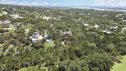 an aerial view of a house in the trees at Canyon Lake Lighthouse in Canyon Lake