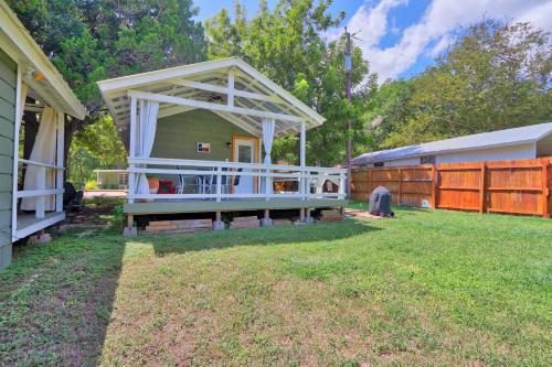 a house with a gazebo in a yard at Creekside Cabins - The Texan in Wimberley