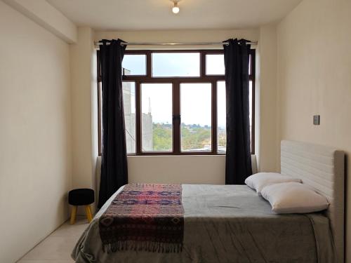 Llit o llits en una habitació de Casa Hormiga