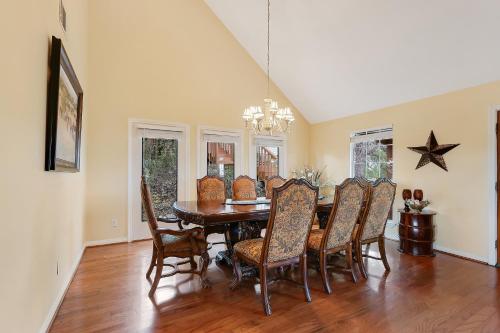 a dining room with a table and chairs at Whispering Ridge Ranch in Wimberley