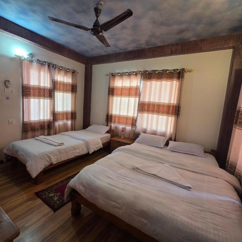 Llit o llits en una habitació de Hotel Hakoniwa