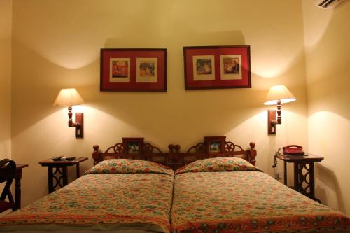 Madhuban - A Heritage Homeにあるベッド